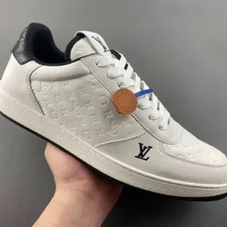 Louis Vuitton LV Trainer Beige Black Embossed Monogram Leather Low-Top Lace-Up Lifestyle Sneakers