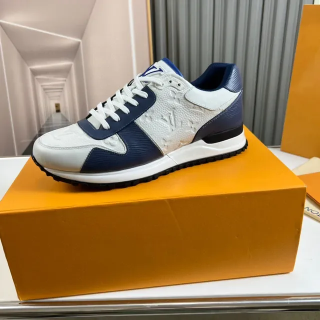 Louis Vuitton LV Trainer Sneakers Lifestyle Blanc et Navy Cuir Monogram Panneaux Bloqués de Couleur 1