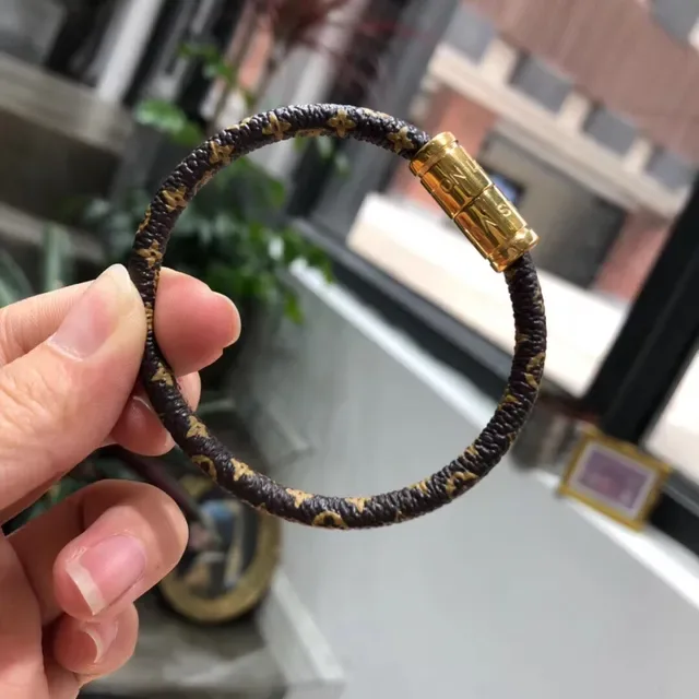 Louis Vuitton Monogram Leather Bracelet Black Gold Braided Cylindrical Magnetic Clasp Bracelet 2