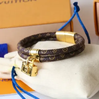 Louis Vuitton Monogram سوار جلد بني مطبوع ذهبي مضفر