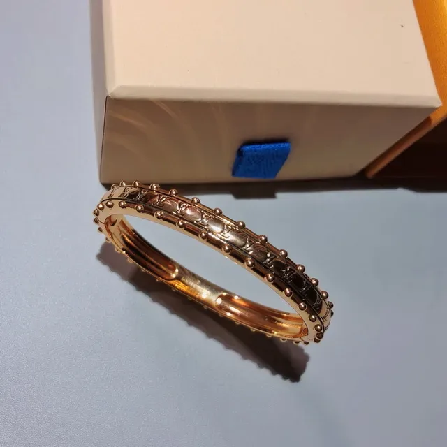 Louis Vuitton Monogram Stud Gold-Tone Studded Bangle Bracelet 6