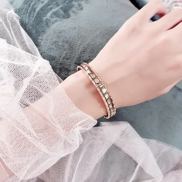 Louis Vuitton Monogram Stud Gold-Tone Studded Bangle Bracelet 9