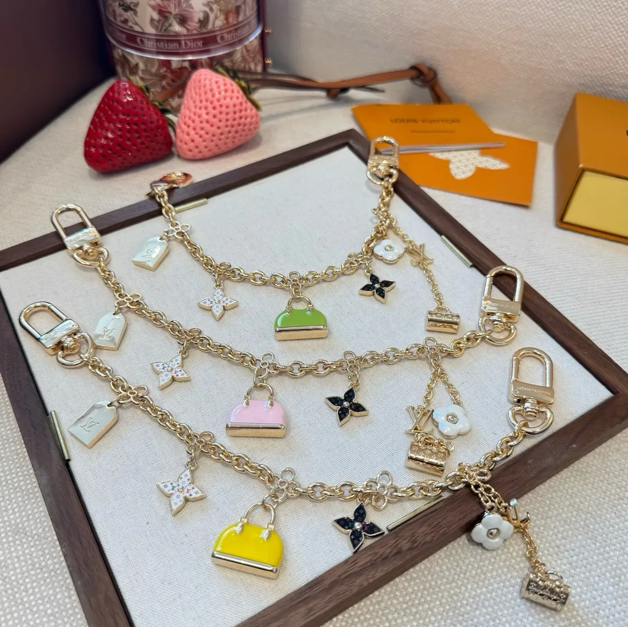 Louis Vuitton Monogram World Tour Gold Pink Chain Multi-Charm Pendant Bracelet 7