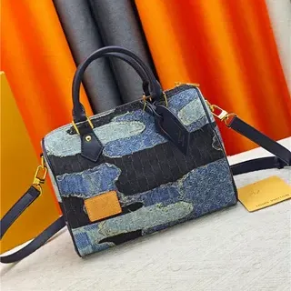 Louis Vuitton Petite Malle Bolso Boston rectangular estructurado patchwork denim azul marino