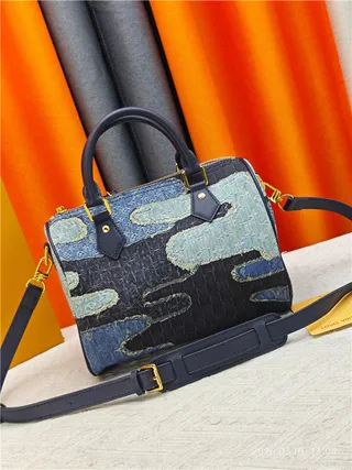 Louis Vuitton Petite Malle Bolso Boston rectangular estructurado patchwork denim azul marino 7