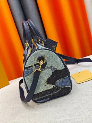 Louis Vuitton Petite Malle Bolso Boston rectangular estructurado patchwork denim azul marino 8
