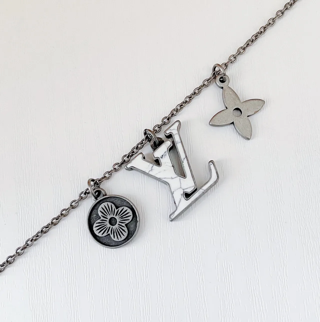 Louis Vuitton Silver Multi-Charm Monogram Pendant Necklace 4