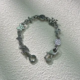 Louis Vuitton Silver White Multi-Charm Polished Metal Bracelet