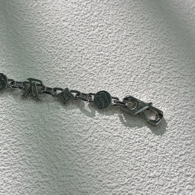 Louis Vuitton Silver White Multi-Charm Polished Metal Bracelet 4