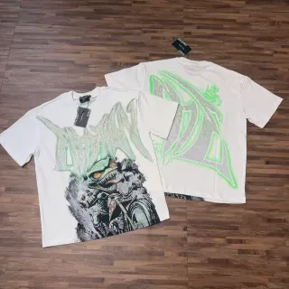Camiseta Mixed Emotion con estampado gráfico de monstruo y pedrería