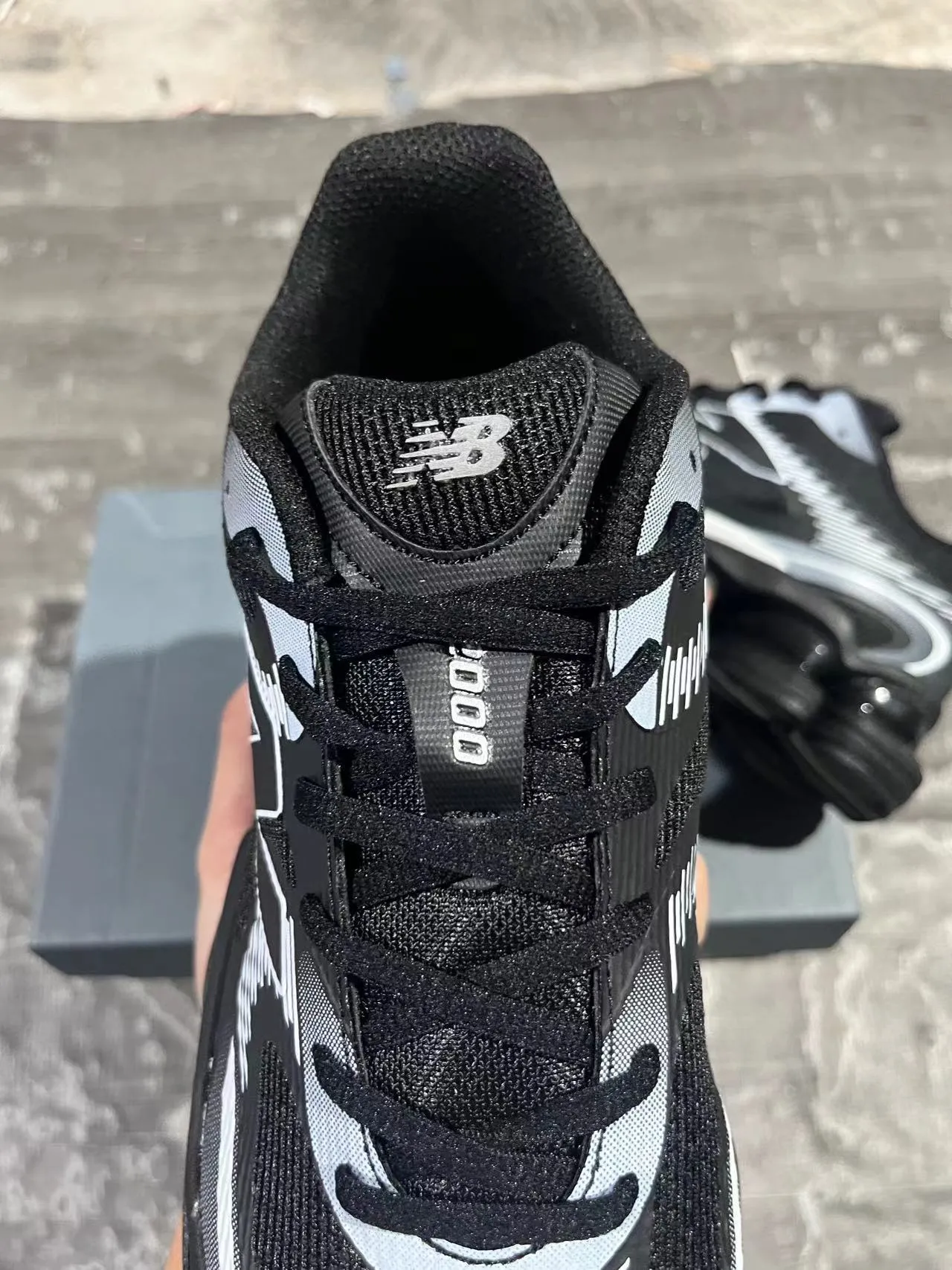 New Balance Noir Gris Podos de semelle intermédiaire segmentés transparents Supérieur en maille synthétique en couches Sneakers lifestyle 5