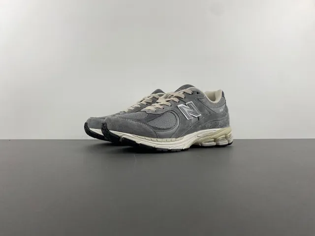 New Balance Tênis Lifestyle Cinza Bege de Suede e Malha com Amortecimento Visível ABZORB no Calcanhar 9