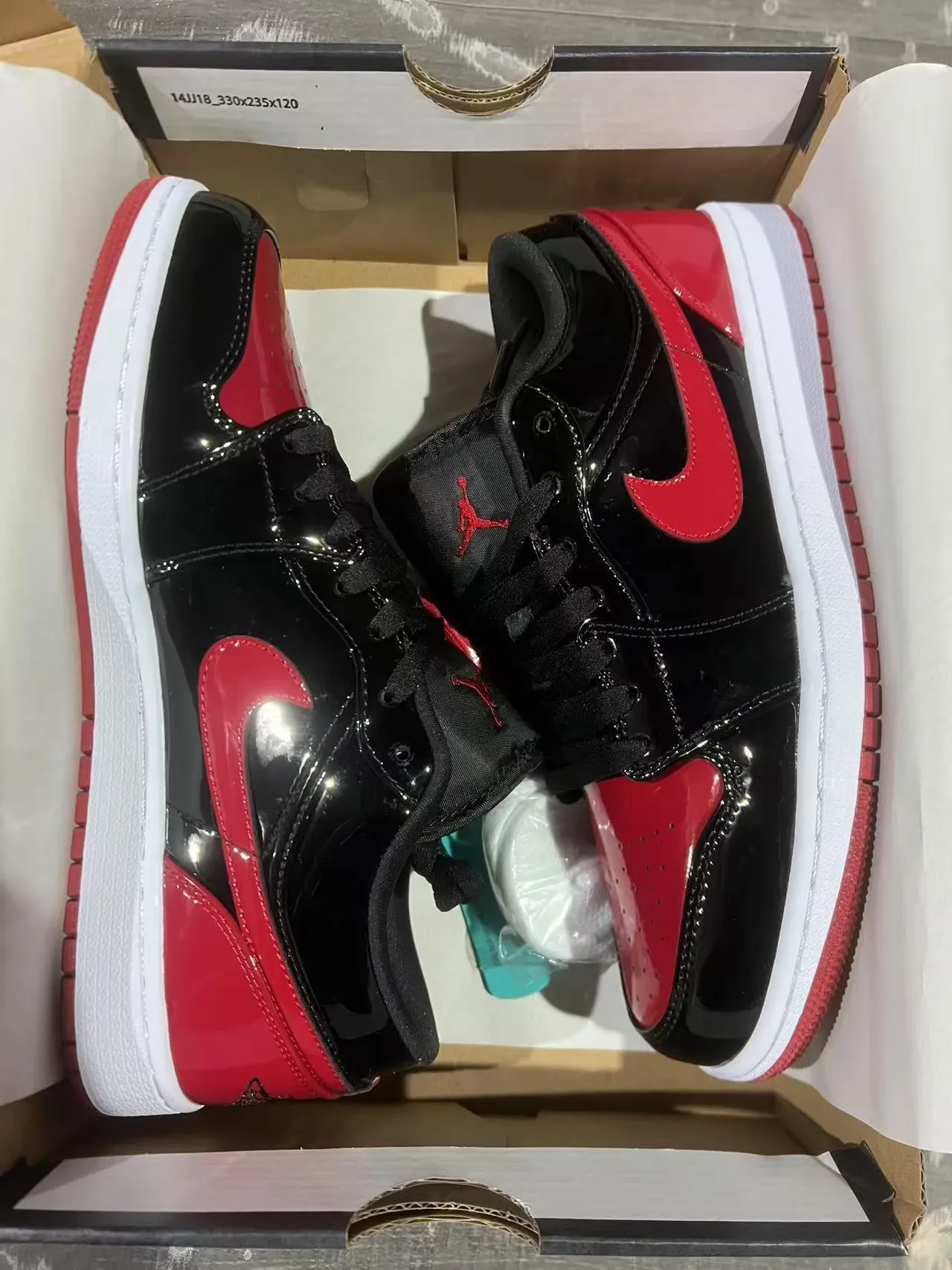 Nike Air Jordan 1 Low Noir Rouge Brillant sneakers lifestyle 9