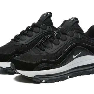 Nike Tênis lifestyle com upper de malha e suede preto e branco, midsole esculpida ondulada
