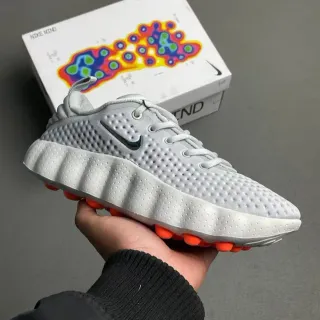 Nike Gray Orange Perforated Knit Upper Sculpted Ridged Midsole Lifestyle Sneakers
