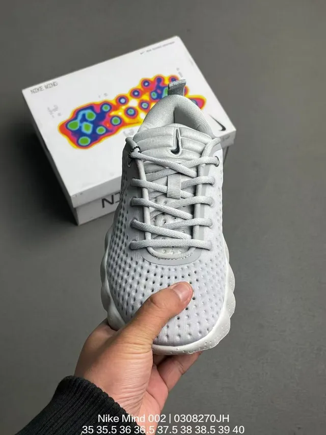 Nike Gray Orange Perforated Knit Upper Sculpted Ridged Midsole Lifestyle Sneakers 6