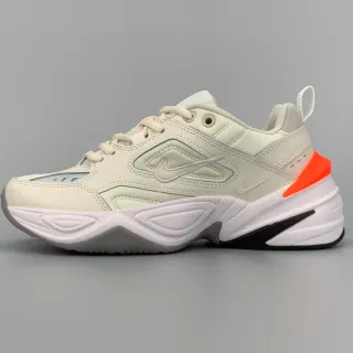 Nike M2K Tekno بيج أورانج طبقات اصطناعية متداخلة منحوتة موجية وسادة وسطية حذاء رياضي سميك