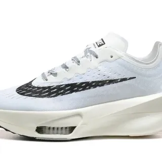 Nike Chaussures de course avec upper en knit blanc et noir asymétrique midsole sculptée