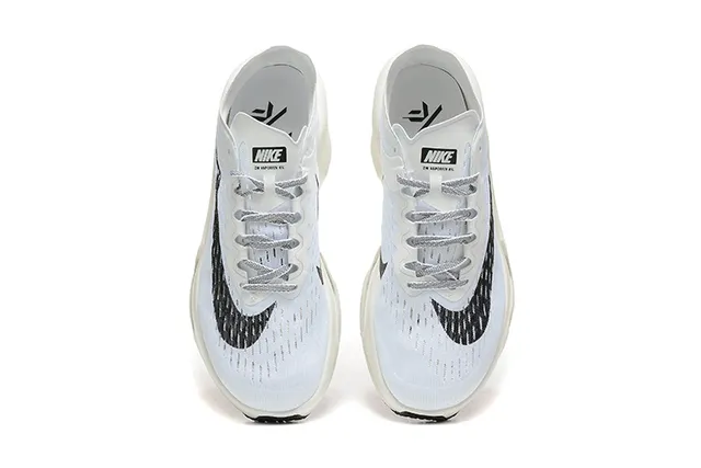 Nike White Black Knit Upper Asymmetrical Sculpted Midsole Running Shoes 2