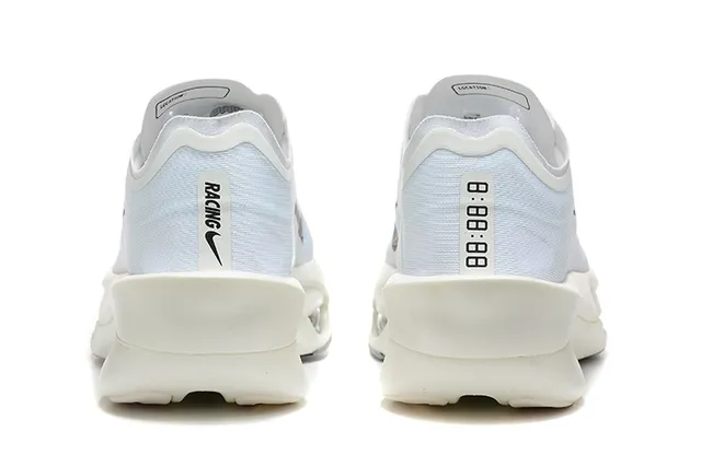 Nike White Black Knit Upper Asymmetrical Sculpted Midsole Running Shoes 4