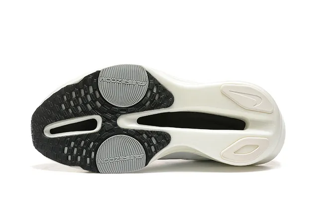 Nike White Black Knit Upper Asymmetrical Sculpted Midsole Running Shoes 5