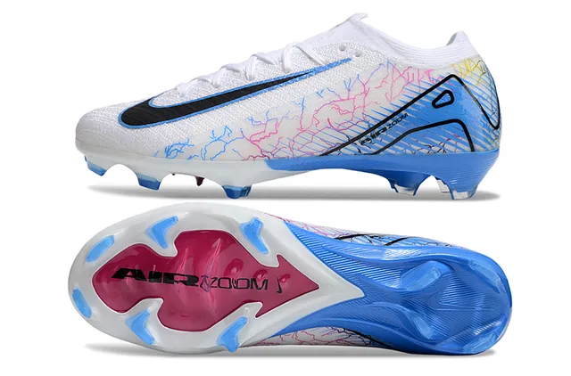 Nike Sapatos de futebol branco e azul de corte baixo com upper de malha overlay de arte gráfica em linha para solo firme 6