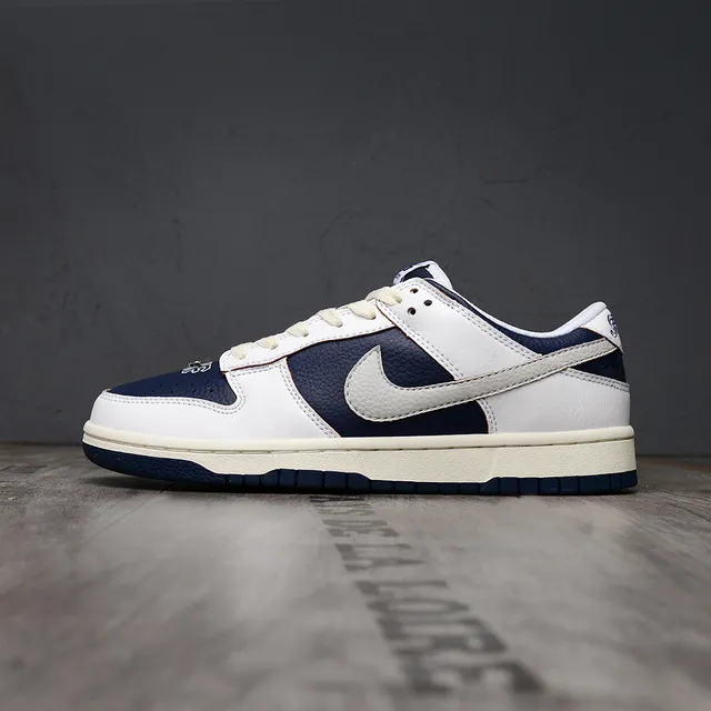 Nike White Navy Low-Top Leather-Paneled Lifestyle Sneakers 7