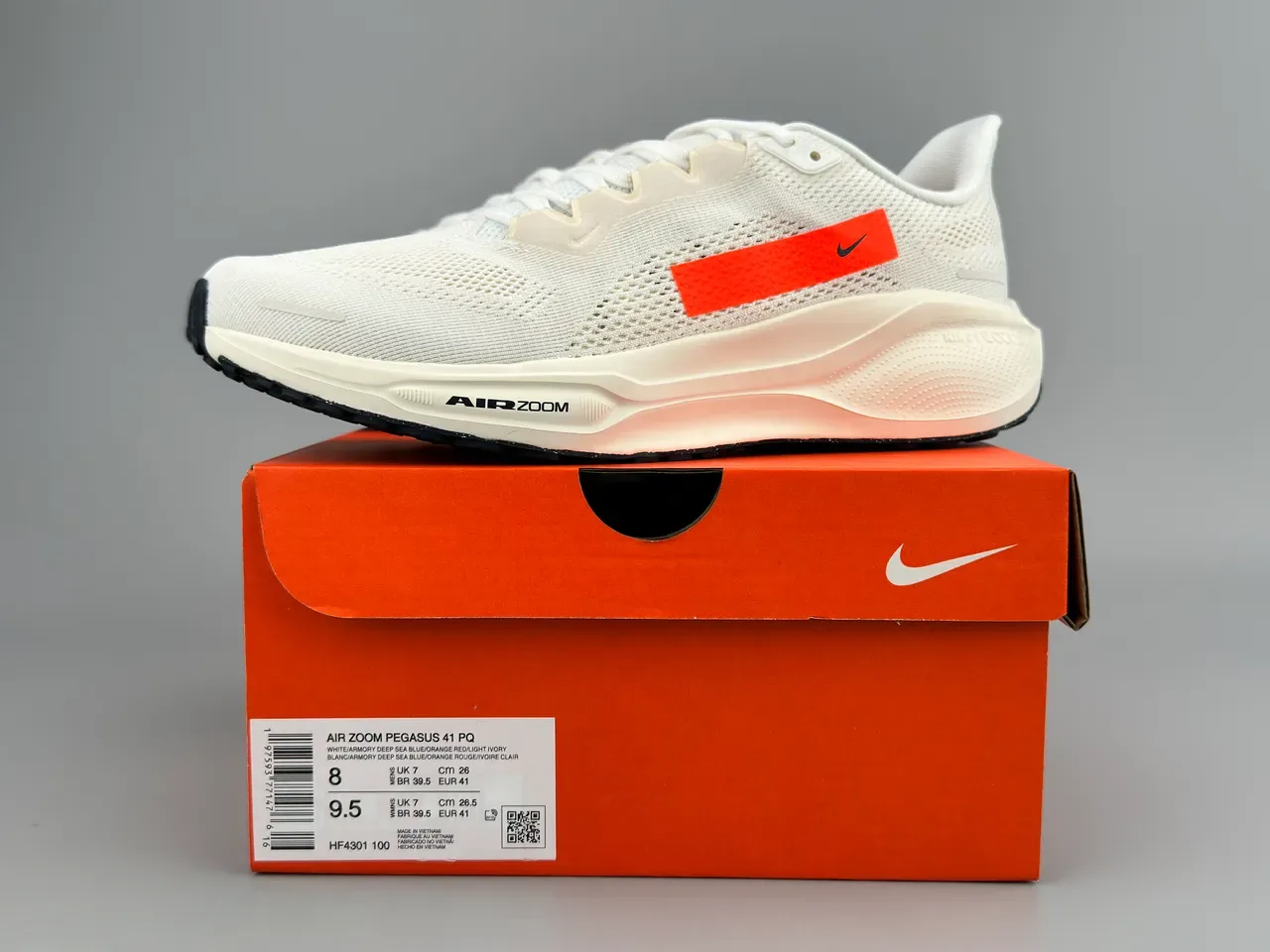 Nike Chaussures Running Blanc Orange Upper Maille Ingénierisée Tab Swoosh Accent 4