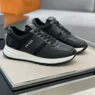 Prada Sneakers Lifestyle Noirs et Blancs en Cuir et Maille Semelle Plateforme