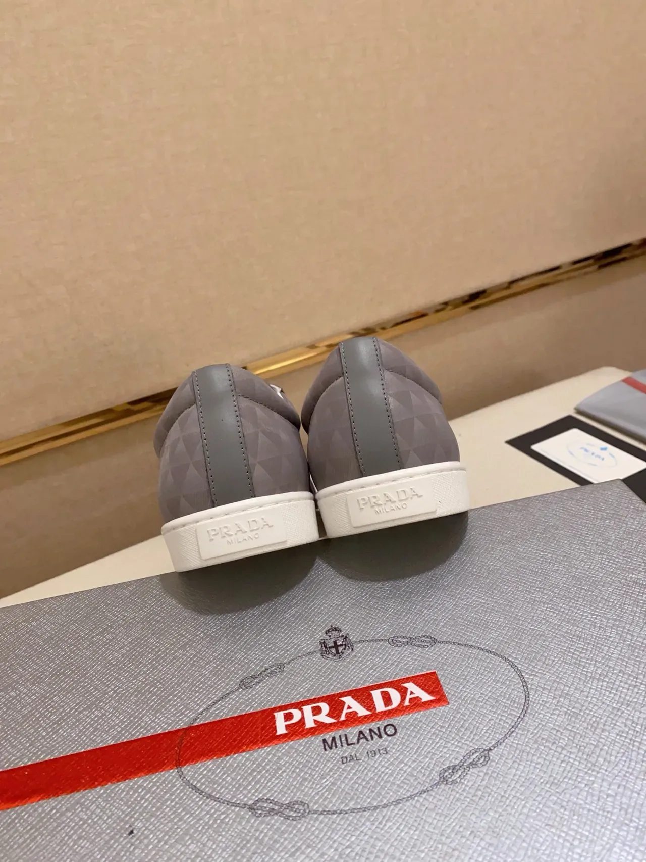 Prada Cloudbust Gray White Low-Top Quilted Triangular Pattern Lifestyle Sneakers 2