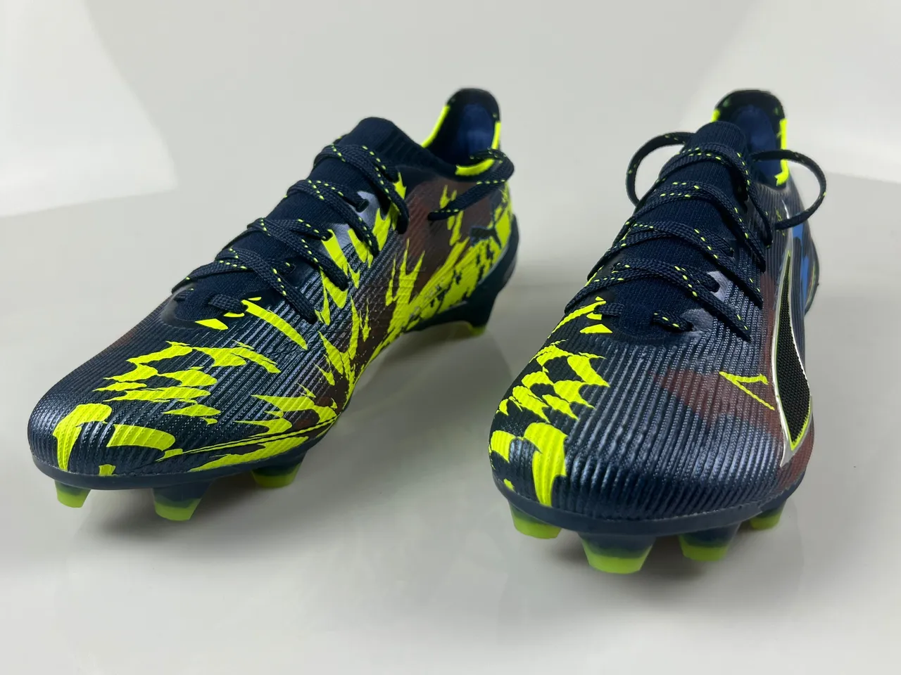 Puma Future Z Navy Yellow Zapatillas de fútbol con cordones asimétricos y upper de calcetín texturizado para terreno firme 8