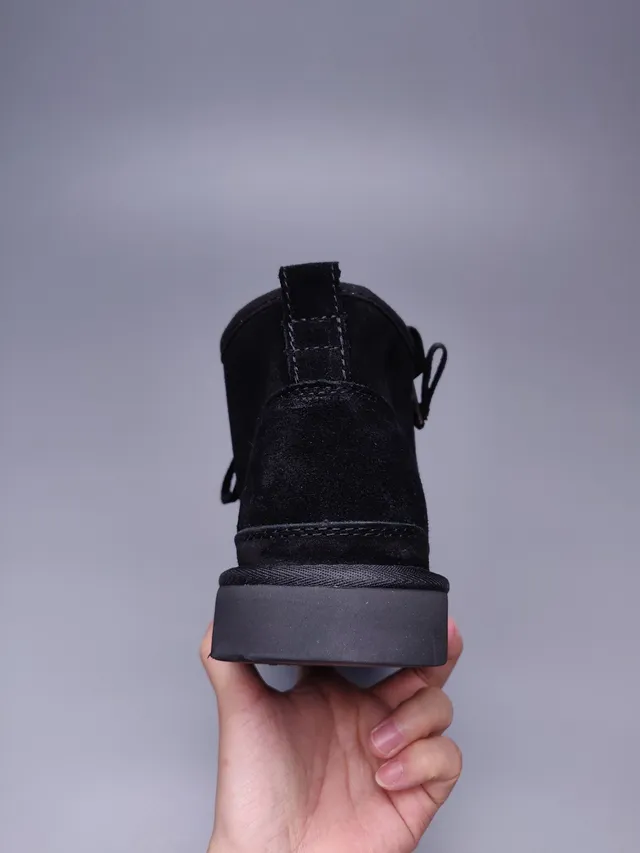 UGG Classic Mini Zip काला सूड एंक्ल बूट 9