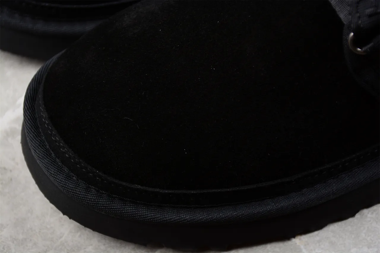 UGG Tasman काले चमड़े के एंक्ल बूट्स 7