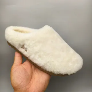 UGG Tasman क्रीम शियरलिंग स्लिपर