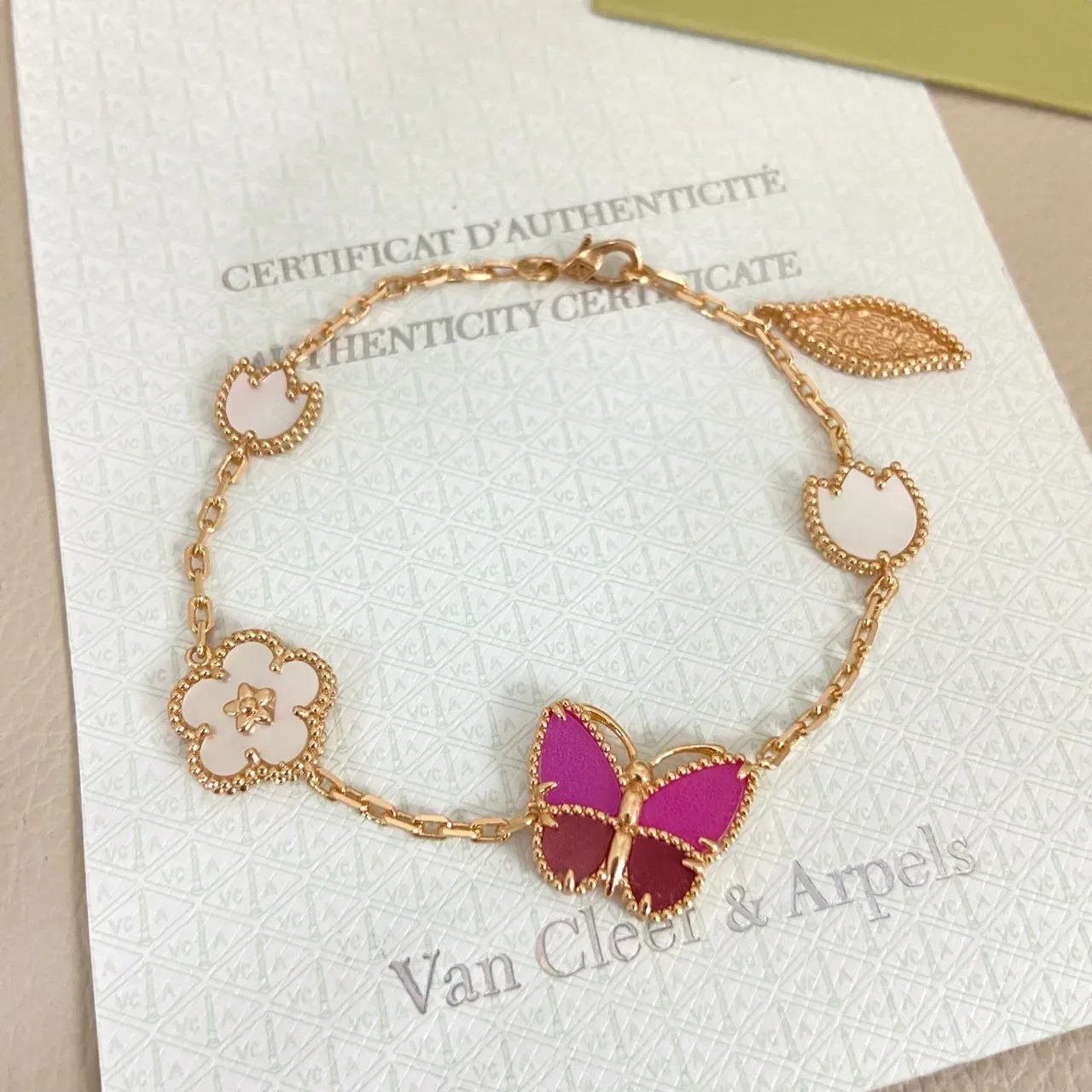 Van Cleef & Arpels Bracelet chaîne or émail papillon et quatrefoil 2