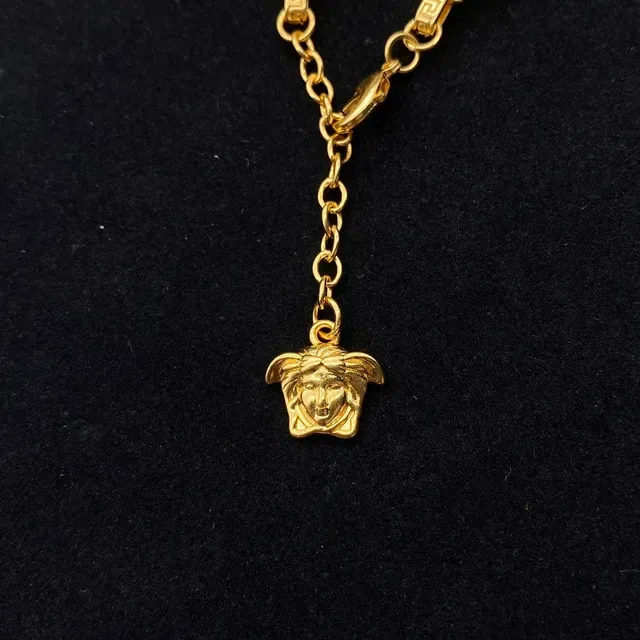 Bracelet Versace Or Noir Métal Émaillé Têtes de Méduse 6