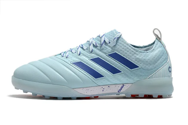 Adidas Chaussures de football Turf en noir et orange avec upper en knit et synthétique 3 rayures 17