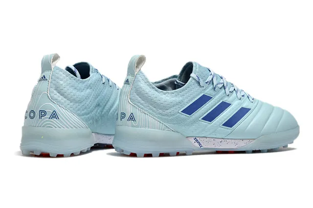Adidas Chaussures de football Turf en noir et orange avec upper en knit et synthétique 3 rayures 19