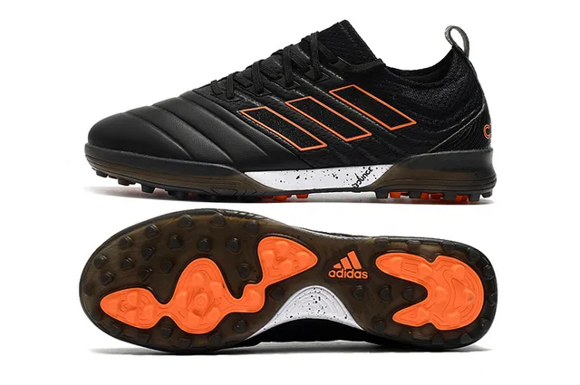 Adidas Chaussures de football Turf en noir et orange avec upper en knit et synthétique 3 rayures 20