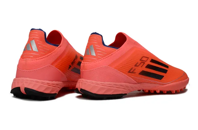 Adidas Chaussures de football turf orange noir slip-on avec upper sock-fit, studs coniques moldés 5