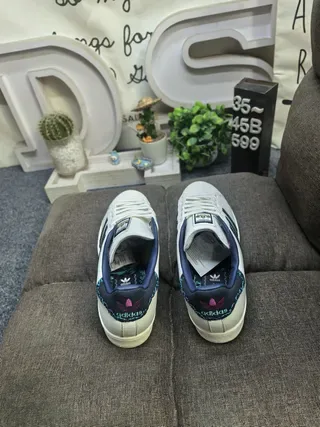 Adidas Superstar Off-White e Navy tênis lifestyle 8