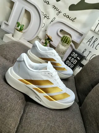Adidas White and Gold Three-Stripe Running Shoes 8