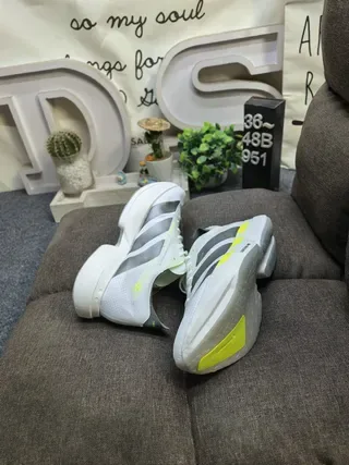 Adidas Chaussures de course blanches jaunes upper mesh engineered sculpted rocker midsole 6