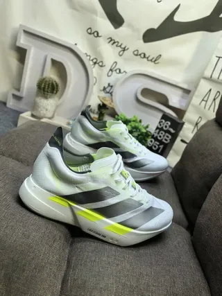 Adidas Chaussures de course blanches jaunes upper mesh engineered sculpted rocker midsole 9