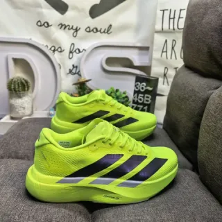 Adidas Zapatillas de running amarillo púrpura neón superior de malla negro y gradiente tres rayas