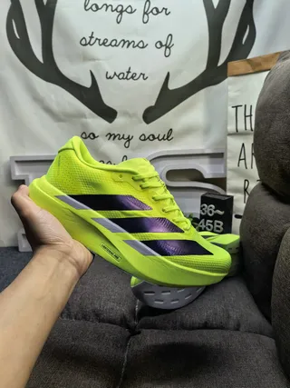 Adidas Zapatillas de running amarillo púrpura neón superior de malla negro y gradiente tres rayas 5
