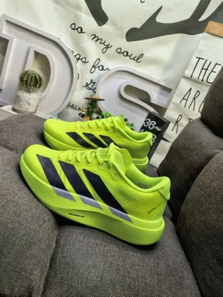 Adidas Zapatillas de running amarillo púrpura neón superior de malla negro y gradiente tres rayas 7