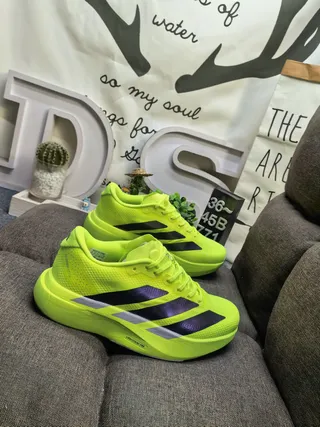 Adidas Zapatillas de running amarillo púrpura neón superior de malla negro y gradiente tres rayas 9