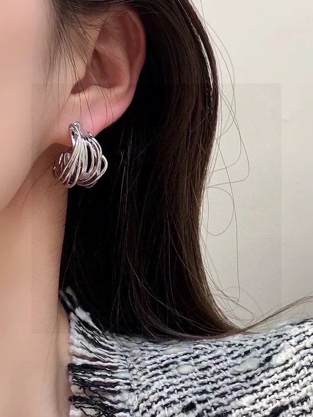 Balenciaga Twisted Hoop Polished Silver-Tone Earrings 8