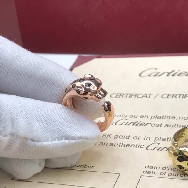 Cartier Bague à bande ouverte avec motif de tête de panthère noire en or 4